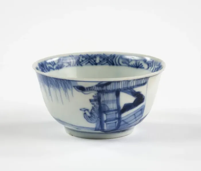 Framed Print : Tea bowl. Porcelain tea bowl with cobalt blue underglaze decoration of three figures Framed Print : Tea bowl. Porcelain tea bowl with cobalt blue underglaze decoration of three figures