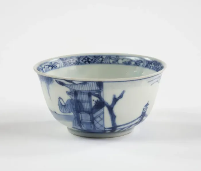 Framed Print : Tea bowl. Porcelain tea bowl with cobalt blue underglaze decoration of three figures Framed Print : Tea bowl. Porcelain tea bowl with cobalt blue underglaze decoration of three figures