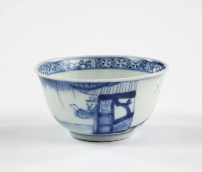 Framed Print : Tea bowl. Porcelain tea bowl with cobalt blue underglaze decoration of three figures Framed Print : Tea bowl. Porcelain tea bowl with cobalt blue underglaze decoration of three figures