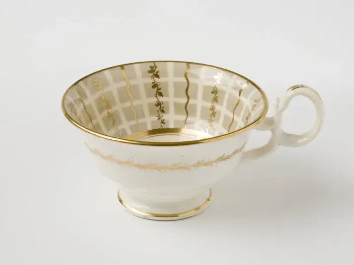 Framed Print : Teacup. Glazed porcelain tea cup from a tea service Framed Print : Teacup. Glazed porcelain tea cup from a tea service