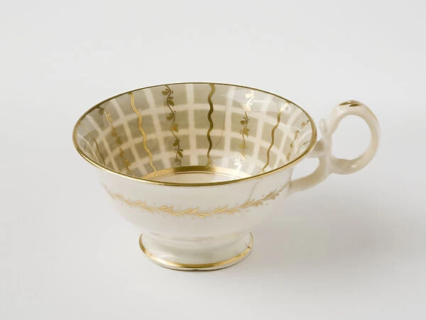 Teacup. Glazed porcelain tea cup from a tea service