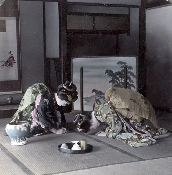 Teahouse geishas, formal greeting, Japan, c. 1900
