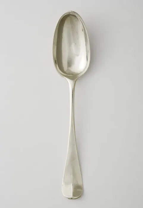 Framed Print : Teaspoon. Silver teaspoon with an upturned handle Framed Print : Teaspoon. Silver teaspoon with an upturned handle