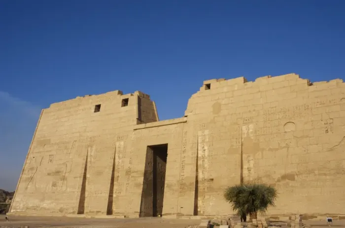 Framed Print : Temple of Ramses III. First pylon with reliefs depicting bat Framed Print : Temple of Ramses III. First pylon with reliefs depicting bat