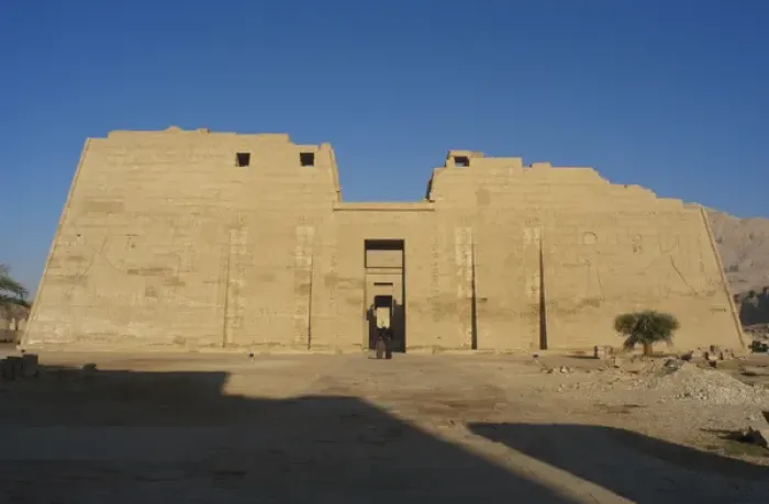Framed Print : Temple of Ramses III. First pylon with reliefs depicting bat Framed Print : Temple of Ramses III. First pylon with reliefs depicting bat