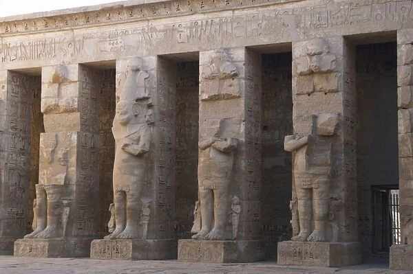 Temple of Ramses III. Great colossal statues of Ramses III d