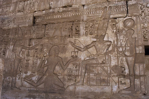Temple of Ramses III. Pharaoh between Amun and Ptah. Egypt
