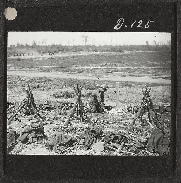 Tending a grave near Mametz Wood, August 1916