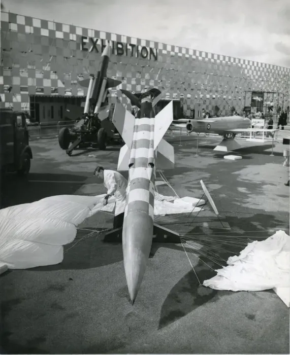 Framed Print : A test rocket used to demonstrate the parachute recover? Framed Print : A test rocket used to demonstrate the parachute recover?