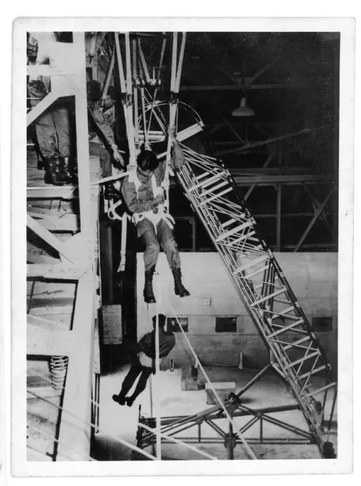 Framed Print : Thai paratroop trainee practising a treescape - parachute Framed Print : Thai paratroop trainee practising a treescape - parachute