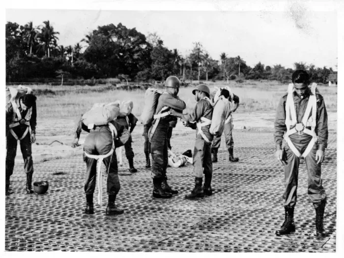 Framed Print : Thai paratroopers fitting parachutes Framed Print : Thai paratroopers fitting parachutes
