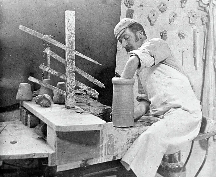 Framed Print : Throwing a pot on a wheel in a pottery factory Framed Print : Throwing a pot on a wheel in a pottery factory
