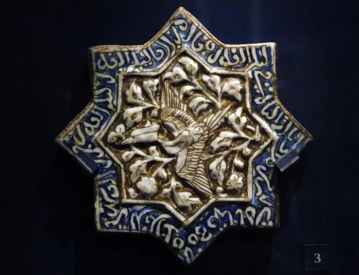 Framed Print : Tile with phoenix and Quranic text. Iran. 1275-1325. Moulded Framed Print : Tile with phoenix and Quranic text. Iran. 1275-1325. Moulded