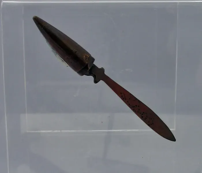 Framed Print : A tiny letter opener beaten from a copper bullet Framed Print : A tiny letter opener beaten from a copper bullet