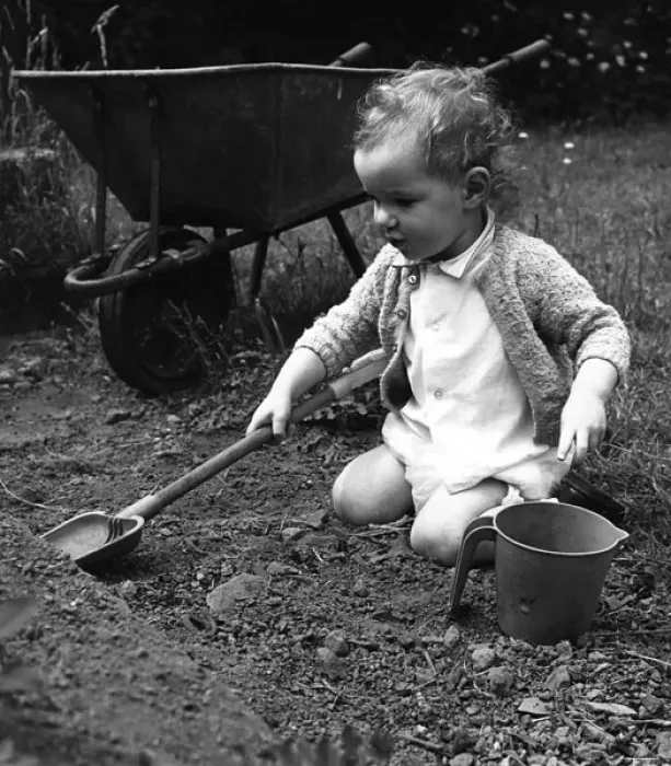 Framed Print : Toddler playing in garden Framed Print : Toddler playing in garden