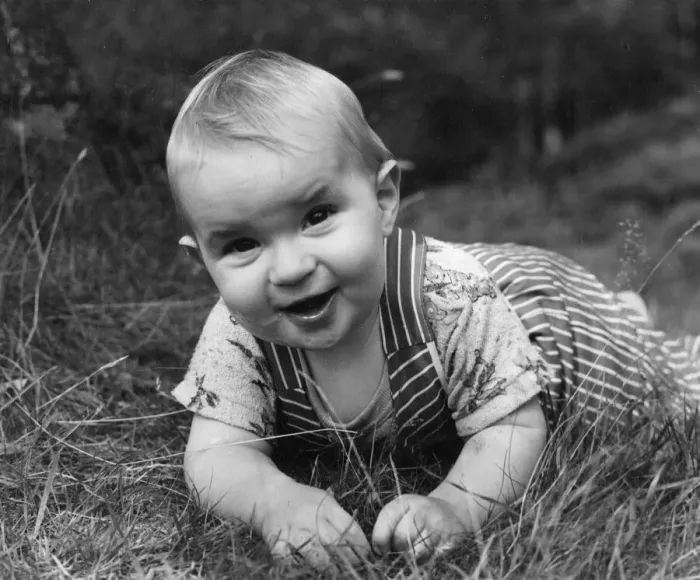 Framed Print : Toddler playing in a garden Framed Print : Toddler playing in a garden