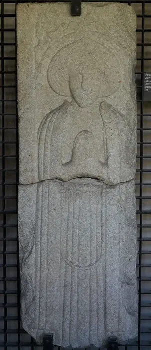 Framed Print : Tombstone with prayer figure in bas-relief Framed Print : Tombstone with prayer figure in bas-relief