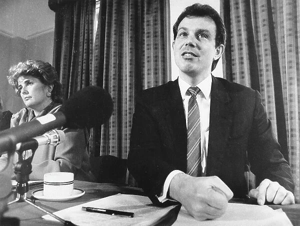 Tony Blair and Brenda Dean at a conference table