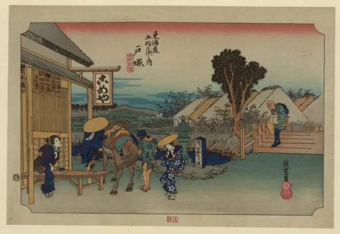 Framed Print : Totsuka. Print shows travelers arriving at an inn or teahouse Framed Print : Totsuka. Print shows travelers arriving at an inn or teahouse