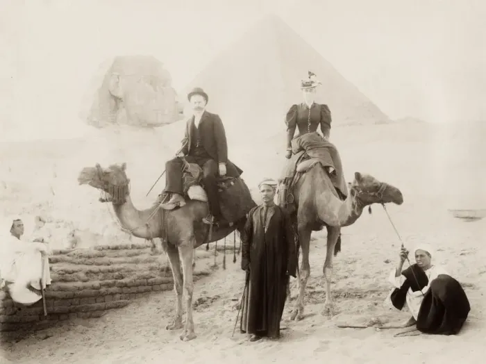 Framed Print : Tourists on camels with guides visiting the Sphinx Framed Print : Tourists on camels with guides visiting the Sphinx