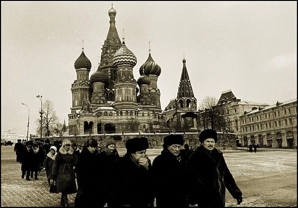 Tourists near St. Basils Cathedral, Red Square, Moscow