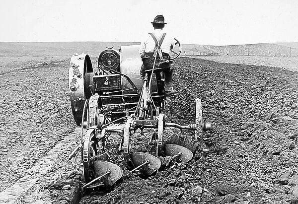 Tractor plowing South Dakota USA early 1900s