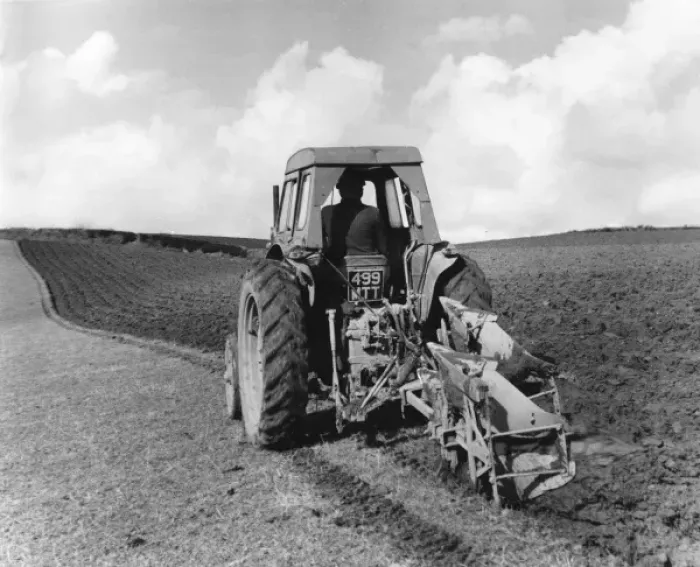 Framed Print : Tractor Pulling a Plough Framed Print : Tractor Pulling a Plough
