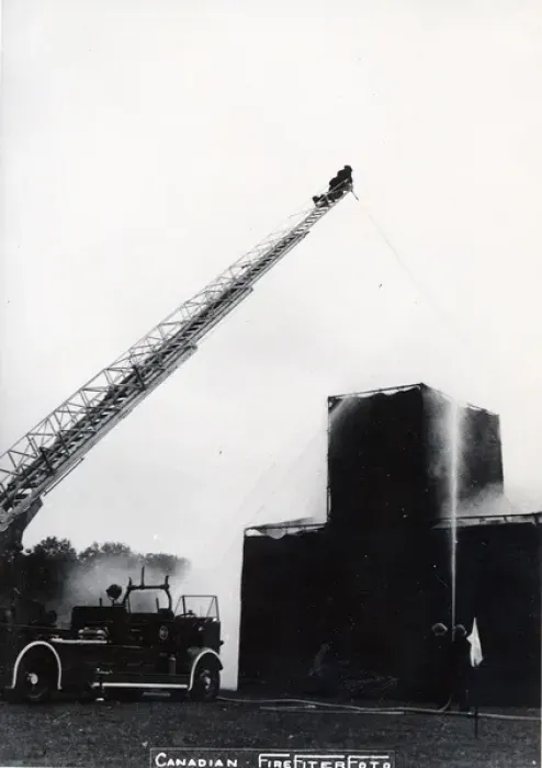 Framed Print : Training. Ladder drill and fire-fighting training on a mocked up building Framed Print : Training. Ladder drill and fire-fighting training on a mocked up building