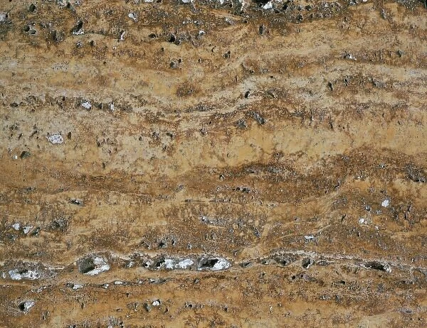 Travertine is a decorative rusty coloured limestone marble from Spain