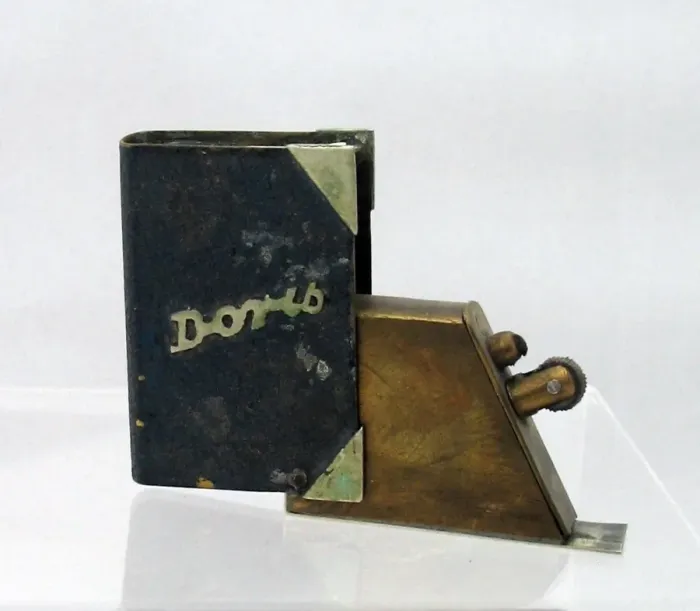 Framed Print : Trench Art lighter in the shape of a book Framed Print : Trench Art lighter in the shape of a book