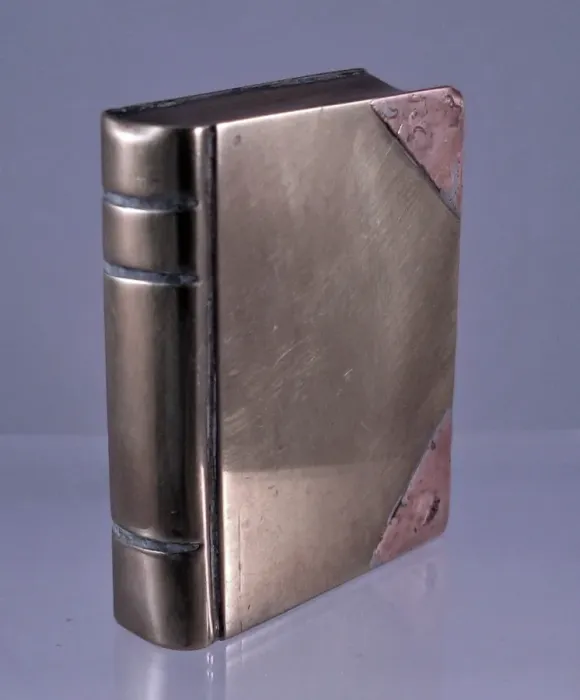 Framed Print : Trench Art lighter in the shape of a book Framed Print : Trench Art lighter in the shape of a book