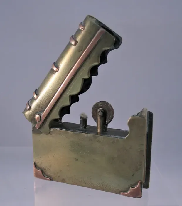 Framed Print : Trench Art lighter in the shape of a book, WW1 Framed Print : Trench Art lighter in the shape of a book, WW1