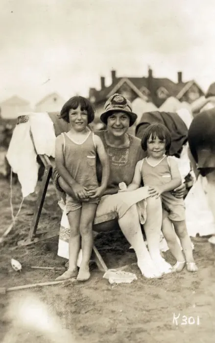 Framed Print : A truly delightful candid seaside photograph of a Mother and her two young daughters on a sandy beach Framed Print : A truly delightful candid seaside photograph of a Mother and her two young daughters on a sandy beach