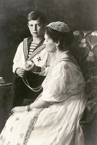 Tsaritsa Alexandra Feodorovna (1872-1918), Empress of Russia and wife of Tsar Nicholas II, together with her son the Tsesarevich Alexei (1905-1918). Date: 1913