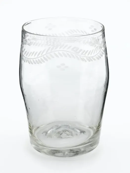 Framed Print : Tumbler. Barrel-shaped glass tumbler engraved with a border of meandering foliage Framed Print : Tumbler. Barrel-shaped glass tumbler engraved with a border of meandering foliage
