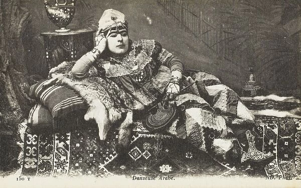 Tunisia - A transvestite arab dancer reclining