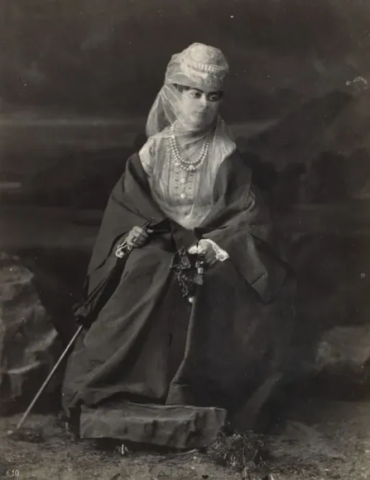 Framed Print : Turkish woman, full-length portrait, seated, facing front, h Framed Print : Turkish woman, full-length portrait, seated, facing front, h
