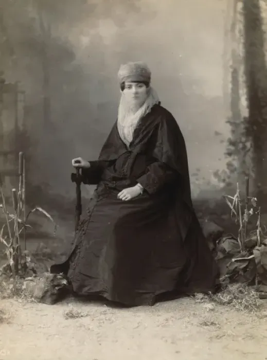 Framed Print : Turkish woman, full-length portrait, seated, facing front, h Framed Print : Turkish woman, full-length portrait, seated, facing front, h