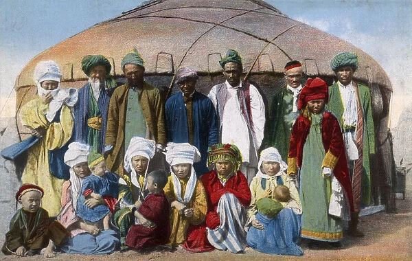 Turkmenistan - Family group standing in front of their yurt