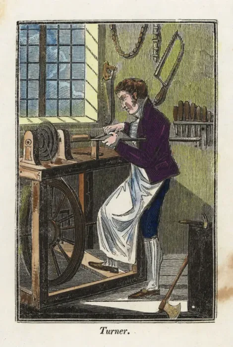Framed Print : A turner in apron using a foot-powered treadle Framed Print : A turner in apron using a foot-powered treadle