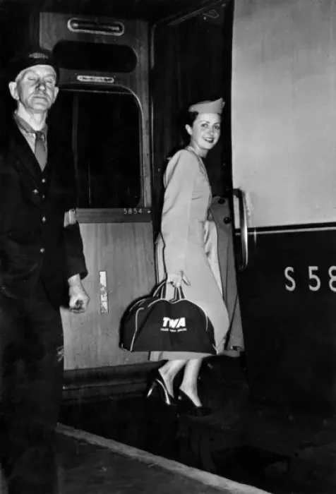 Framed Print : TWA air stewardess boarding a train Framed Print : TWA air stewardess boarding a train