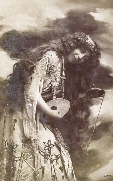 Unusual woman playing a small stringed instrument