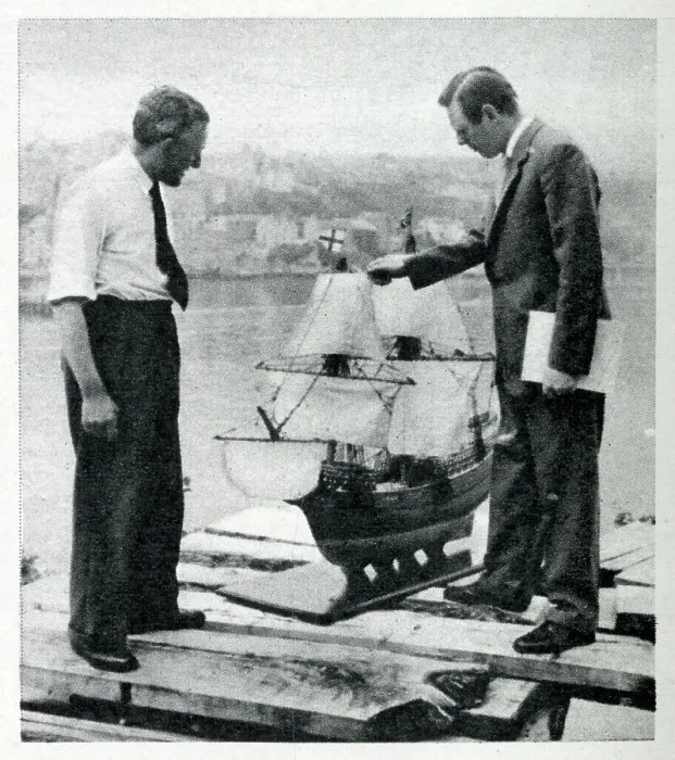 Framed Print : Upham and Charlton inspect a scale model of the Mayflower II, built in the 1950s as an exact replica of the original Mayflower ship. Date: 1956
