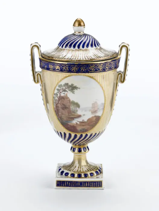 Framed Print : Urn made from porcelain with a white ground, painted in gold Framed Print : Urn made from porcelain with a white ground, painted in gold