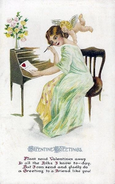 Valentine Card. A girl sits at her desk composing a Valentine - helped by a Cupid