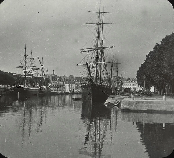 Vannes - black & white view of river with quays and shipping town in background Date