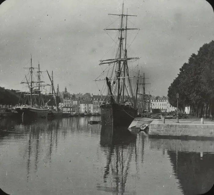 Framed Print : Vannes - black and white view of river with quays and shipping town in background Date Framed Print : Vannes - black and white view of river with quays and shipping town in background Date