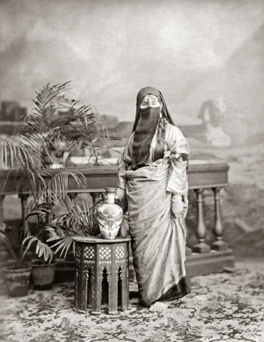 Framed Print : Veiled woman with ornate jug, Egypt, circa 1890