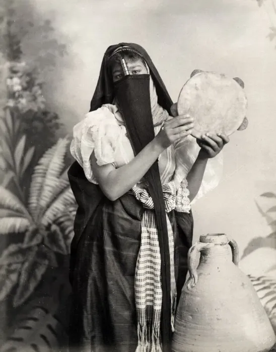 Framed Print : Veiled woman with tambourine, Egypt Framed Print : Veiled woman with tambourine, Egypt