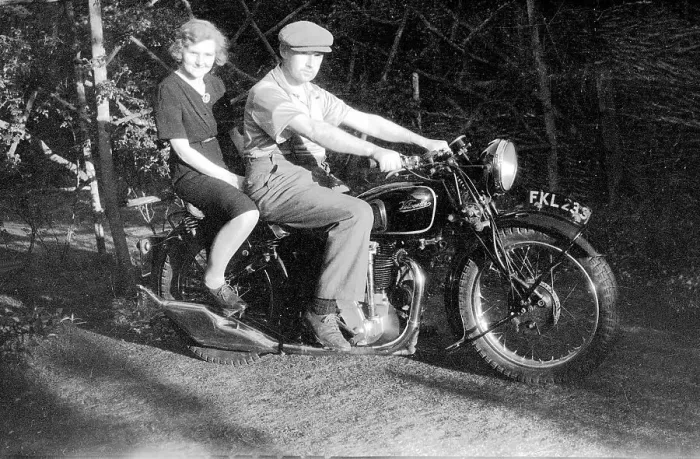 Framed Print : Velocette motorcycle with couple Framed Print : Velocette motorcycle with couple